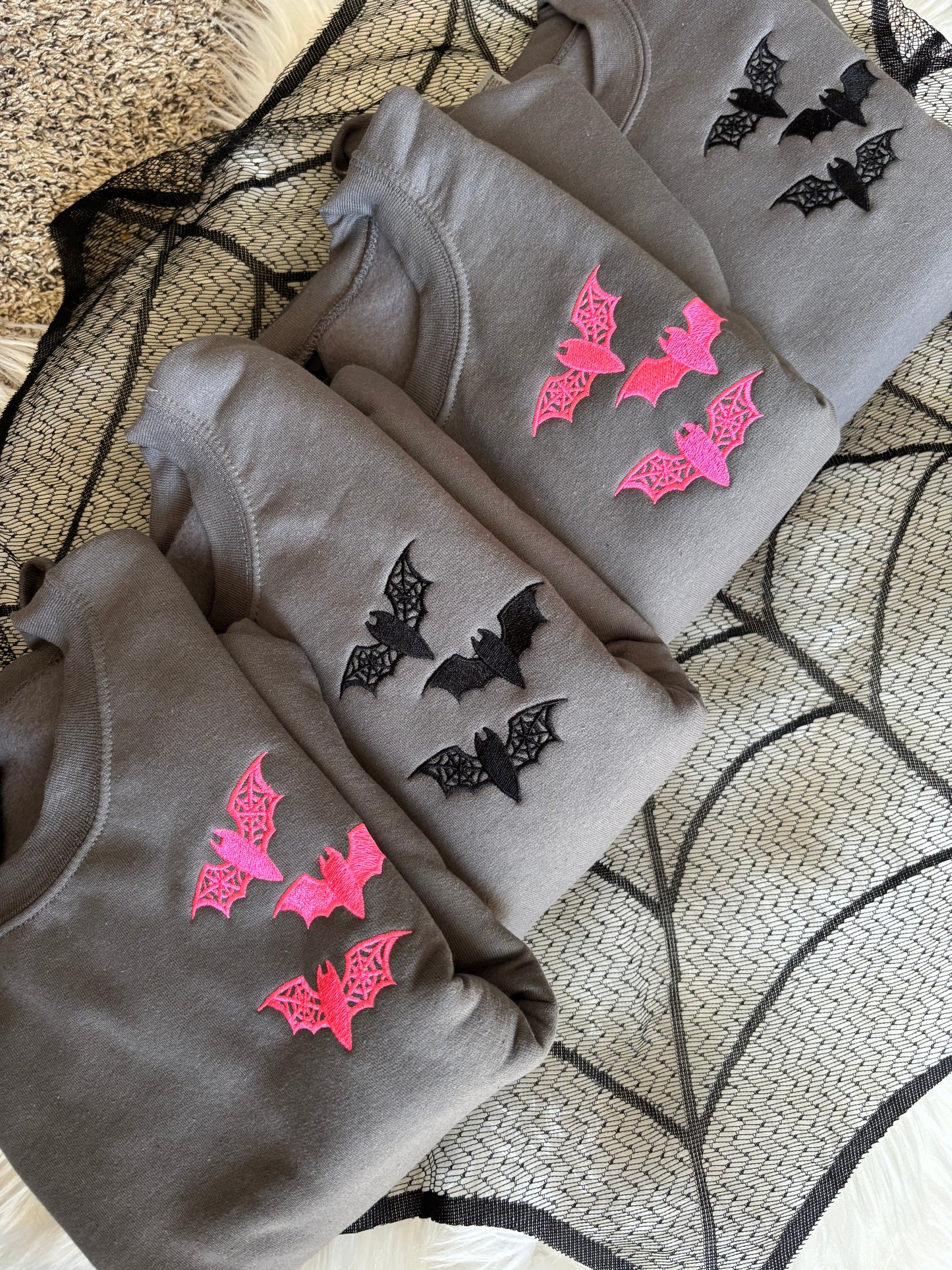 BAT EMBROIDERED CREWNECKS