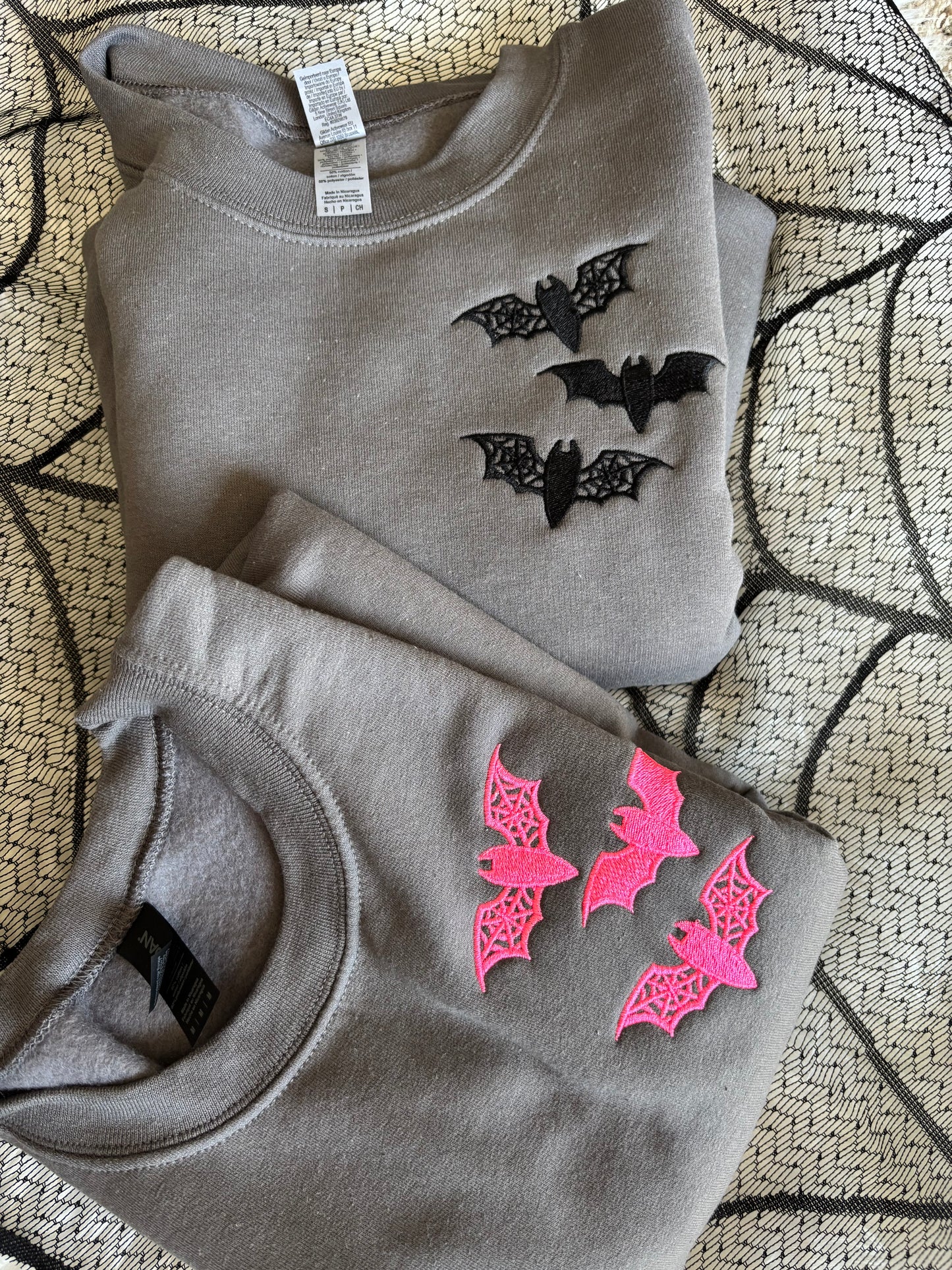 BAT EMBROIDERED CREWNECKS